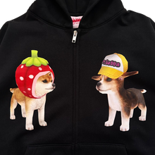 Load image into Gallery viewer, A black zip-up hoodie featuring two printed dog illustrations. On the left, a tan and white dog wears a red strawberry costume with green leaves.
